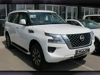 Nissan  Patrol  SE  2023  Automatic  0 Km  6 Cylinder  Four Wheel Drive (4WD)  SUV  White  With Warranty