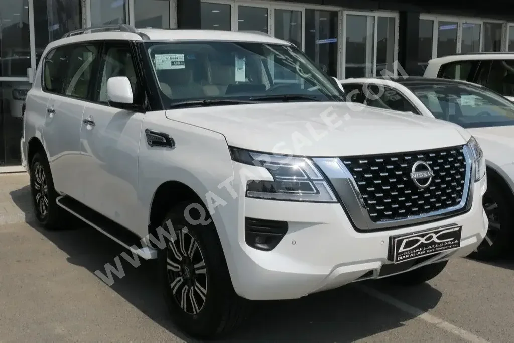 Nissan  Patrol  SE  2023  Automatic  0 Km  6 Cylinder  Four Wheel Drive (4WD)  SUV  White  With Warranty