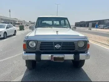 Nissan  Patrol  Safari  1991  Manual  123,999 Km  6 Cylinder  Four Wheel Drive (4WD)  SUV  Silver  With Warranty