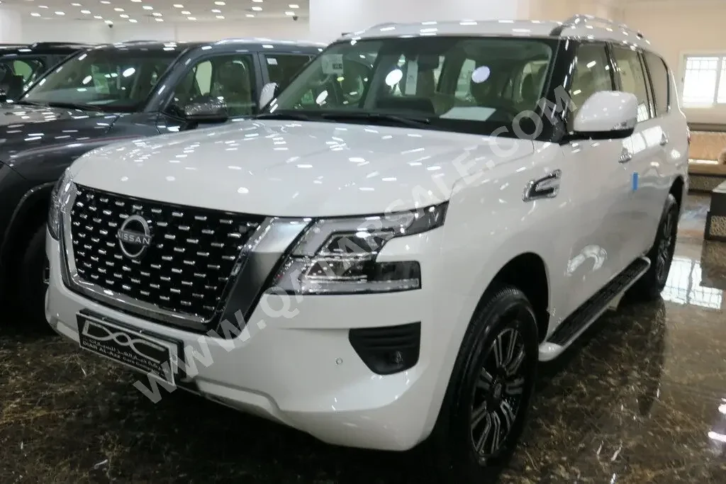 Nissan  Patrol  SE  2023  Automatic  0 Km  6 Cylinder  Four Wheel Drive (4WD)  SUV  White  With Warranty