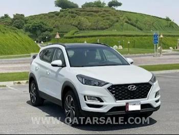 Hyundai  Tucson  4 Cylinder  SUV 4x4  White  2021