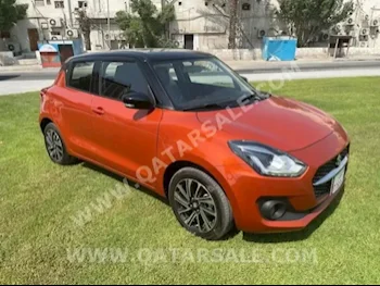 Suzuki  Swift  4 Cylinder  Hatchback  Orange  2022