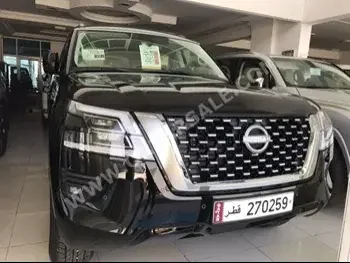  Nissan  Patrol  SE  2023  Automatic  0 Km  6 Cylinder  Four Wheel Drive (4WD)  SUV  Black  With Warranty