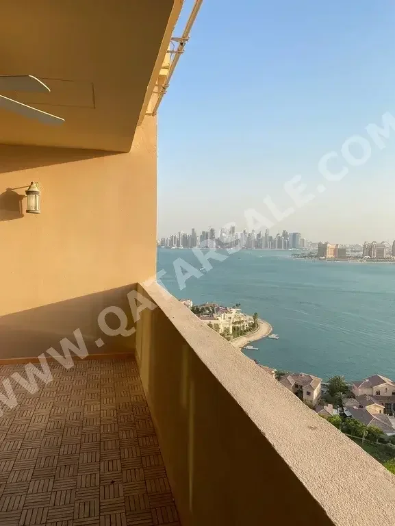 3 Bedrooms  Apartment  For Sale  in Doha -  The Pearl  Semi Furnished