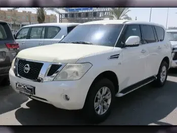 Nissan  Patrol  SE  2013  Automatic  178,000 Km  8 Cylinder  Four Wheel Drive (4WD)  SUV  White  With Warranty