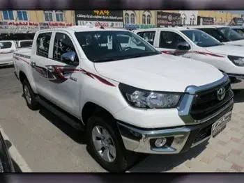 Toyota  Hilux  2023  Automatic  0 Km  4 Cylinder  Four Wheel Drive (4WD)  Pick Up  White  With Warranty