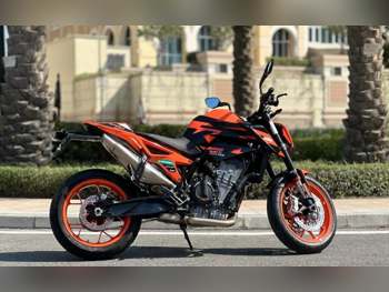 كيه تي ام  دوك 890 جي بي -  2023 - اللون برتقالي -  الضمان