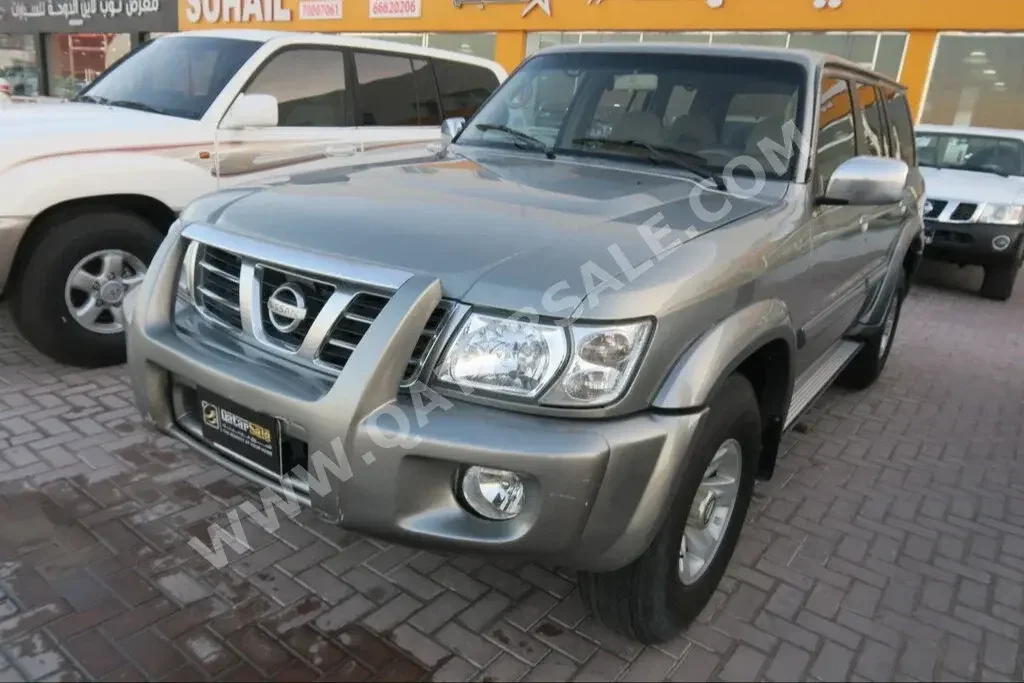 Nissan  Patrol  Super Safari  2003  Automatic  280,000 Km  6 Cylinder  Four Wheel Drive (4WD)  SUV  Gray  With Warranty