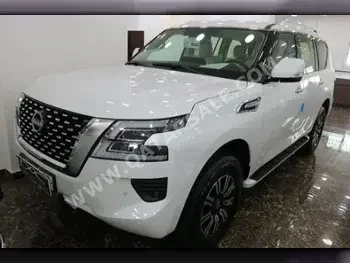 Nissan  Patrol  SE  2023  Automatic  0 Km  6 Cylinder  Four Wheel Drive (4WD)  SUV  White  With Warranty