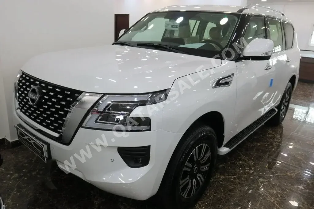 Nissan  Patrol  SE  2023  Automatic  0 Km  6 Cylinder  Four Wheel Drive (4WD)  SUV  White  With Warranty