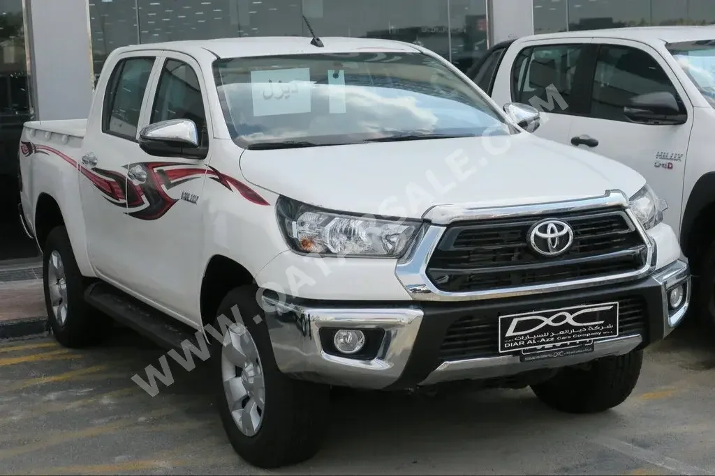  Toyota  Hilux  2023  Automatic  0 Km  4 Cylinder  Four Wheel Drive (4WD)  Pick Up  White  With Warranty