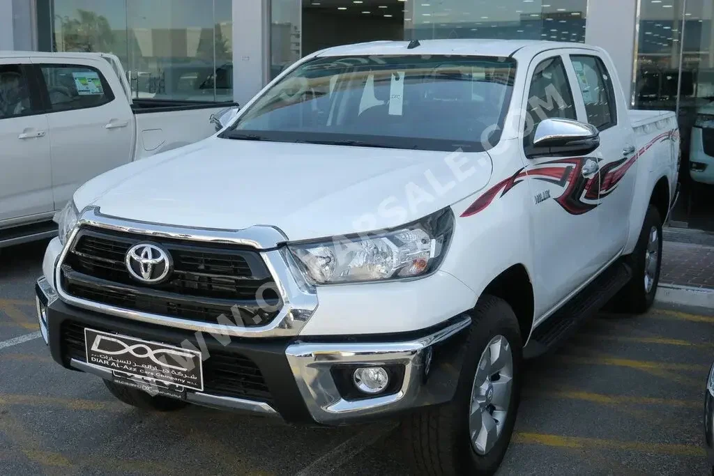 Toyota  Hilux  2023  Automatic  0 Km  4 Cylinder  Four Wheel Drive (4WD)  Pick Up  White  With Warranty