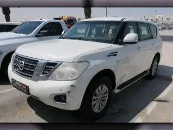 Nissan  Patrol  SE  2014  Automatic  205,000 Km  8 Cylinder  Four Wheel Drive (4WD)  SUV  White  With Warranty