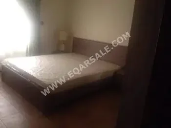 2 Bedrooms  Apartment  For Rent  in Doha -  Fereej Al Nasr  Fully Furnished