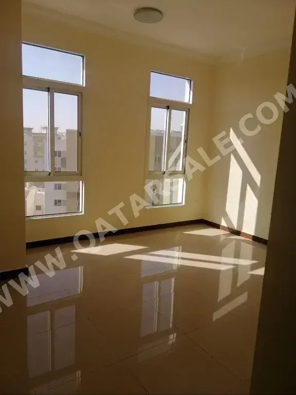 2 Bedrooms  Apartment  For Rent  in Doha -  Al Mansoura  Not Furnished