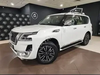 Nissan  Patrol  Platinum  2023  Automatic  3,000 Km  6 Cylinder  Four Wheel Drive (4WD)  SUV  White  With Warranty