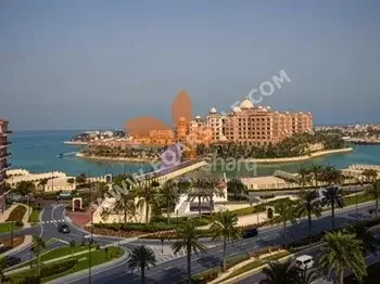 2 Bedrooms  Apartment  For Sale  in Doha -  The Pearl  Semi Furnished