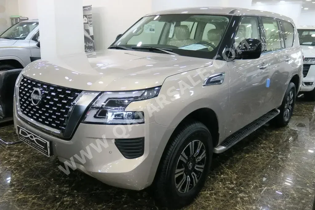 Nissan  Patrol  XE  2023  Automatic  0 Km  6 Cylinder  Four Wheel Drive (4WD)  SUV  Gold  With Warranty