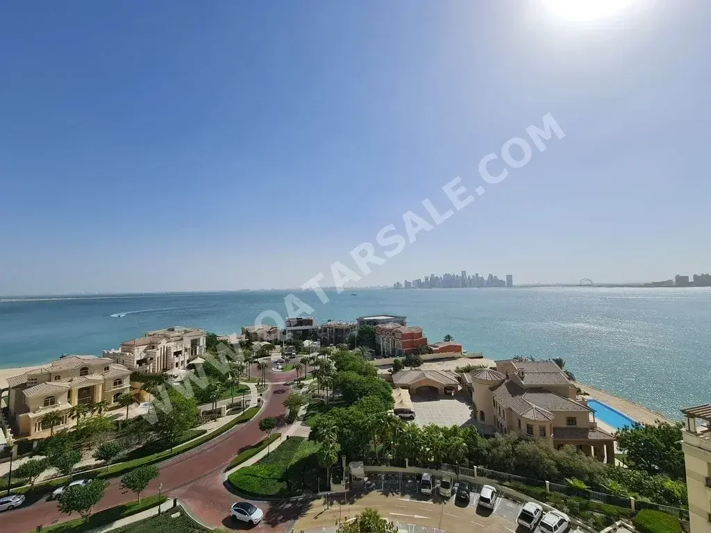 2 Bedrooms  Apartment  For Rent  in Doha -  The Pearl  Semi Furnished