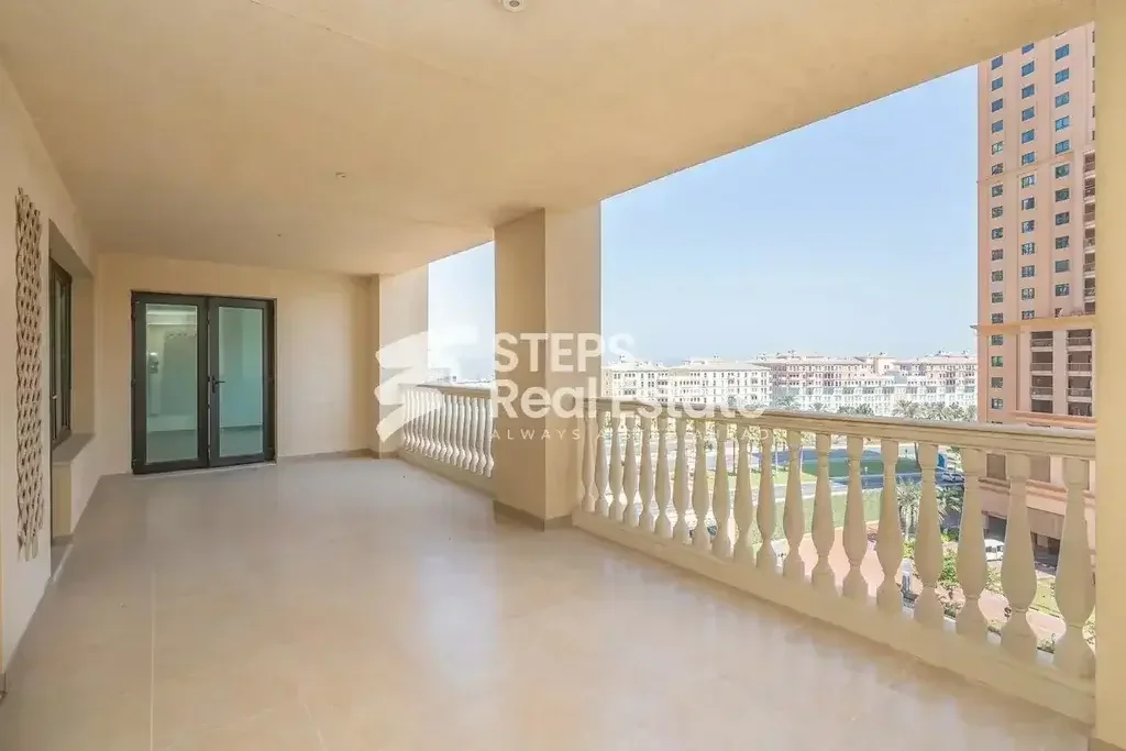 2 Bedrooms  Apartment  For Rent  in Doha -  The Pearl  Semi Furnished