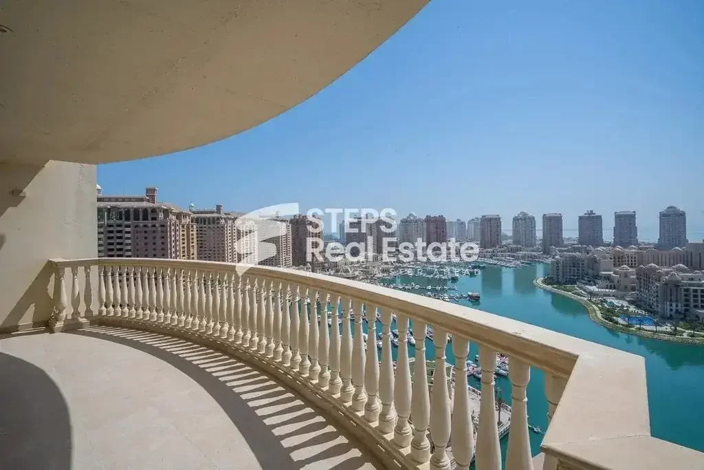 3 Bedrooms  Apartment  For Rent  in Doha -  The Pearl  Semi Furnished