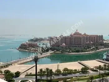 3 Bedrooms  Apartment  For Rent  in Doha -  The Pearl  Semi Furnished