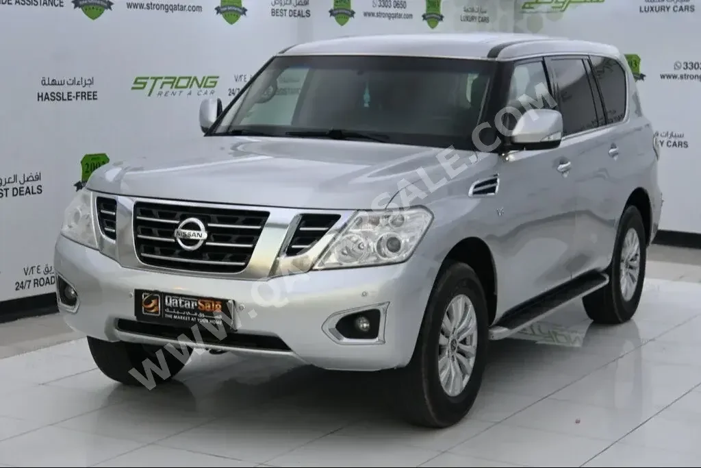 Nissan  Patrol  SE  2014  Automatic  167,000 Km  8 Cylinder  Four Wheel Drive (4WD)  SUV  Silver  With Warranty