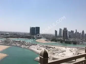 2 Bedrooms  Apartment  For Rent  in Doha -  The Pearl  Fully Furnished