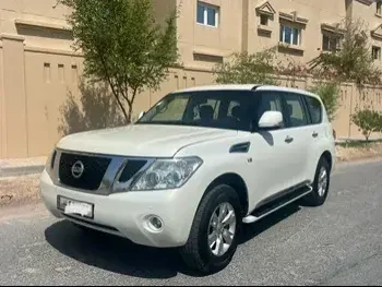 Nissan  Patrol  SE  2013  Automatic  399,000 Km  8 Cylinder  Four Wheel Drive (4WD)  SUV  White  With Warranty