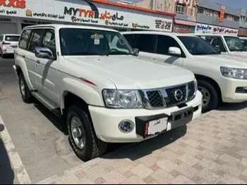 Nissan  Patrol  Safari  2023  Manual  0 Km  6 Cylinder  Four Wheel Drive (4WD)  SUV  White  With Warranty