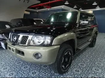 Nissan  Patrol  Super Safari  2021  Manual  43,000 Km  6 Cylinder  Four Wheel Drive (4WD)  SUV  Black  With Warranty