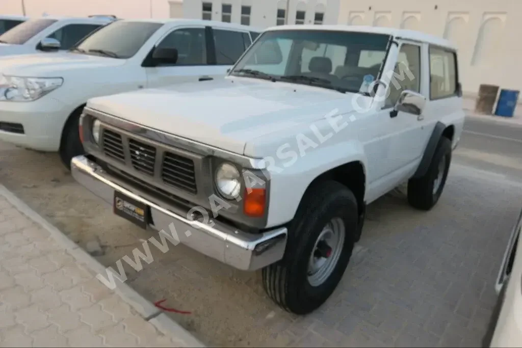 Nissan  Patrol  Safari  1990  Manual  220,000 Km  6 Cylinder  Four Wheel Drive (4WD)  SUV  White  With Warranty