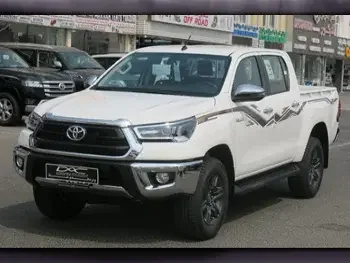 Toyota  Hilux  2024  Automatic  0 Km  4 Cylinder  Four Wheel Drive (4WD)  Pick Up  White  With Warranty