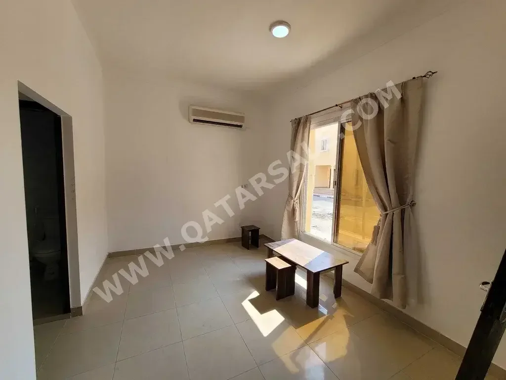 1 Bedrooms  Studio  For Rent  in Doha -  New Sleta  Not Furnished