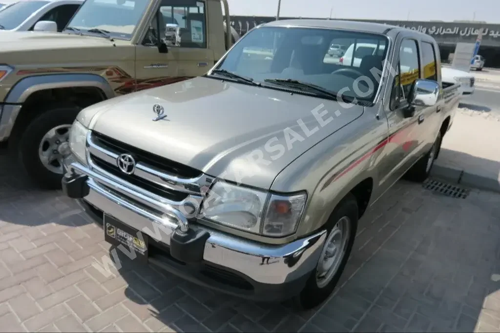 Toyota  Hilux  2003  Manual  148,000 Km  4 Cylinder  Four Wheel Drive (4WD)  Pick Up  Gray