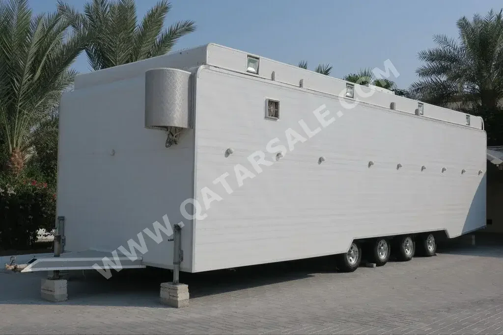 Caravan - 2021  - White  -Made in Qatar