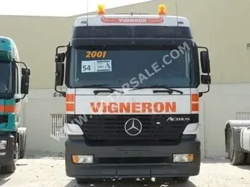 ابيض + برتقالي  2001  اتوماتيك و نص كهرباء  المانيا  مرسيدس  اكتروس