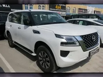 Nissan  Patrol  XE  2023  Automatic  0 Km  6 Cylinder  Four Wheel Drive (4WD)  SUV  White  With Warranty