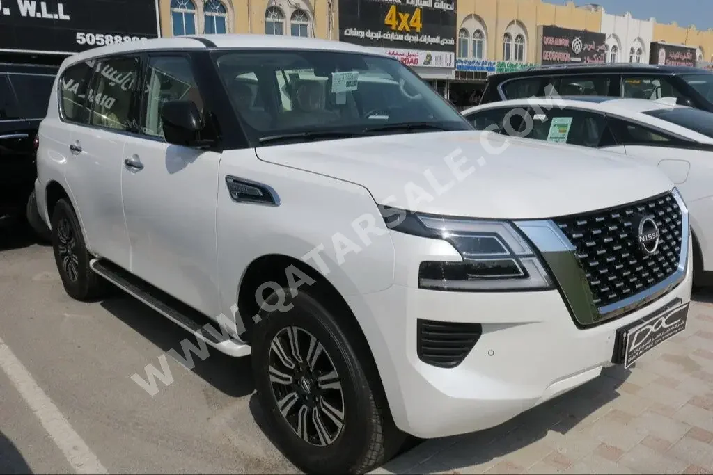 Nissan  Patrol  XE  2023  Automatic  0 Km  6 Cylinder  Four Wheel Drive (4WD)  SUV  White  With Warranty