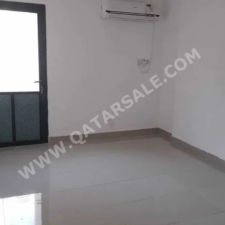 Labour Camp 2 Bedrooms  Apartment  For Rent  in Doha -  Fereej New Al Hitmi  Not Furnished