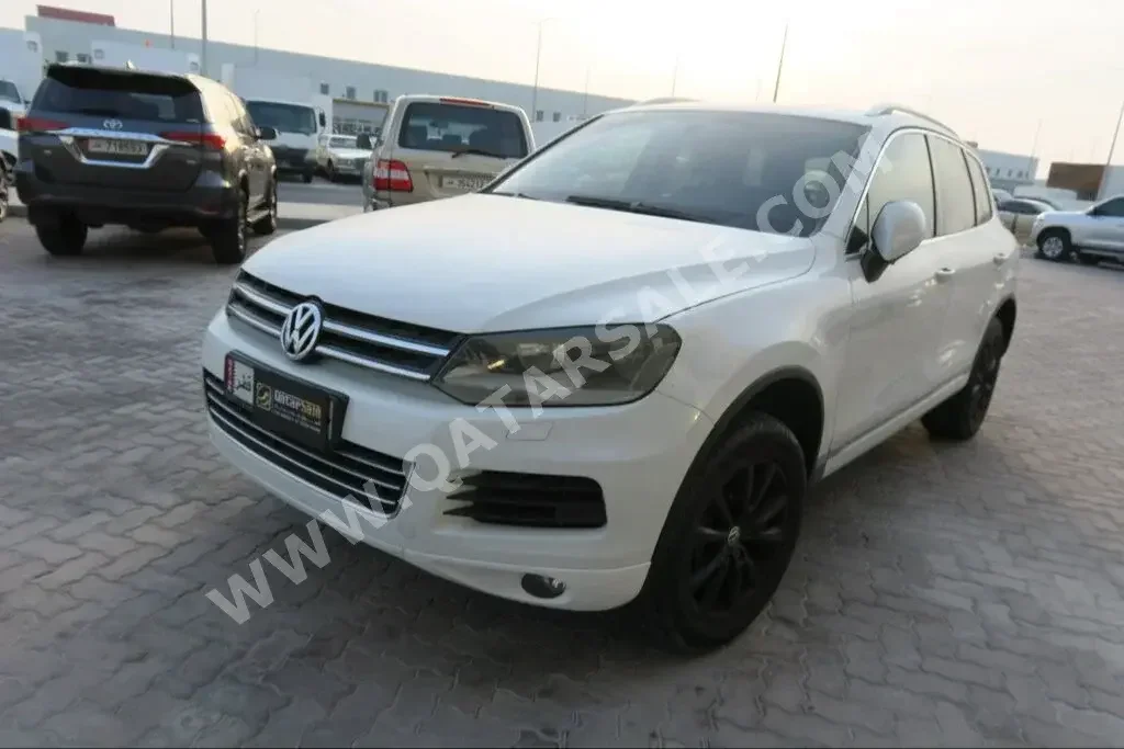 Volkswagen  Touareg  2014  Automatic  140,000 Km  6 Cylinder  All Wheel Drive (AWD)  SUV  White