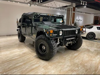 Hummer  H1  Alpha  2000  Automatic  65٬000 Km  8 Cylinder  Four Wheel Drive (4WD)  SUV  Green