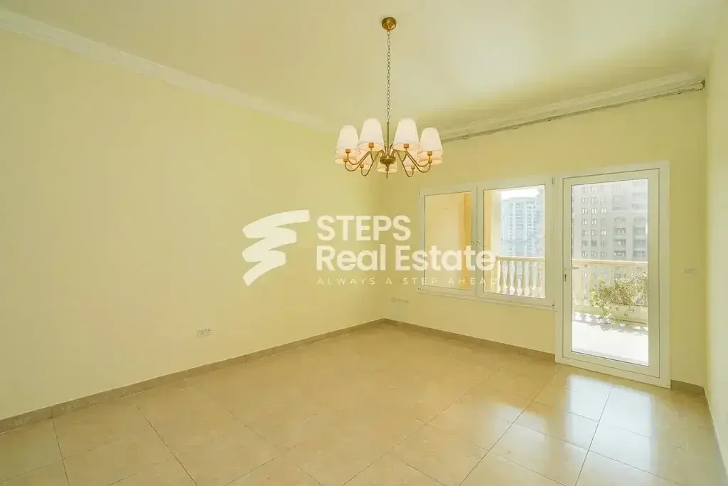 2 Bedrooms  Apartment  For Rent  in Doha -  The Pearl  Semi Furnished