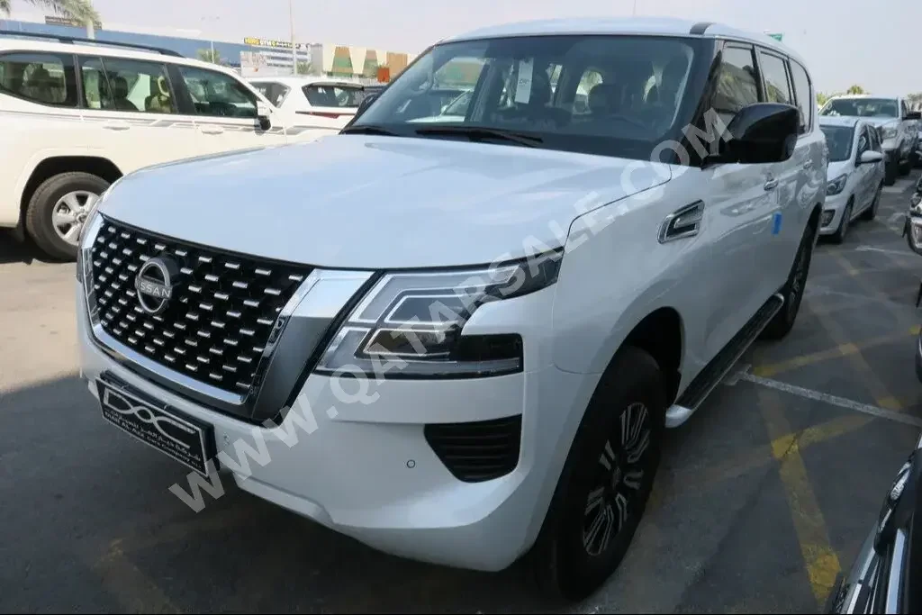 Nissan  Patrol  XE  2023  Automatic  0 Km  6 Cylinder  Four Wheel Drive (4WD)  SUV  White  With Warranty