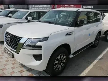 Nissan  Patrol  XE  2023  Automatic  0 Km  6 Cylinder  Four Wheel Drive (4WD)  SUV  White  With Warranty