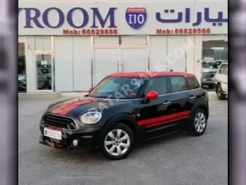 Mini  Cooper  CountryMan  2018  Automatic  94,000 Km  3 Cylinder  Rear Wheel Drive (RWD)  Hatchback  Black and Red