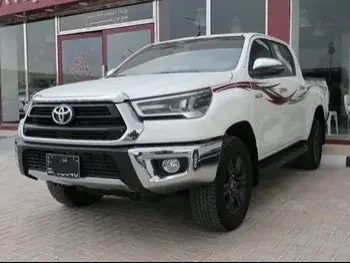 Toyota  Hilux  SR5  2022  Automatic  47,000 Km  4 Cylinder  Four Wheel Drive (4WD)  Pick Up  White
