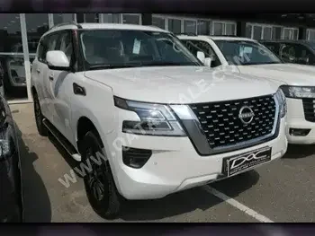  Nissan  Patrol  SE  2023  Automatic  0 Km  6 Cylinder  Four Wheel Drive (4WD)  SUV  White  With Warranty