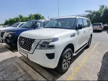 Nissan  Patrol  XE  2023  Automatic  0 Km  6 Cylinder  Four Wheel Drive (4WD)  SUV  White  With Warranty