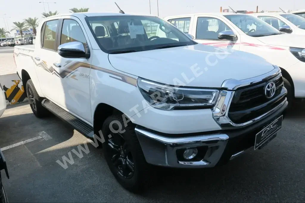 Toyota  Hilux  2024  Automatic  0 Km  4 Cylinder  Four Wheel Drive (4WD)  Pick Up  White  With Warranty